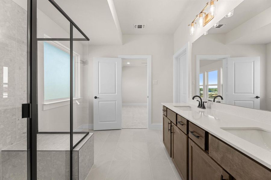 Furnished interior view inside a new home in Cottage Collection at Harvest, Argyle (Image 10).