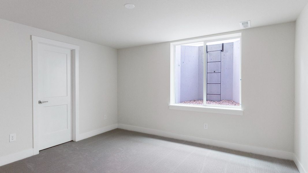 Furnished interior view inside a new home in Dillon Pointe - Journey, Broomfield (Image 21).