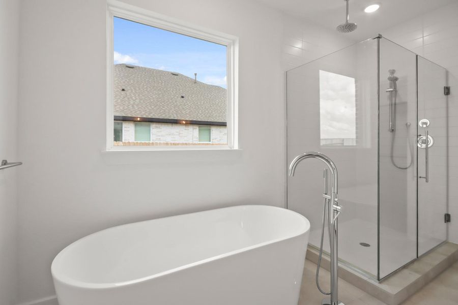 Luxurious primary bath (*Photo not of actual home and used for illustration purposes only.)