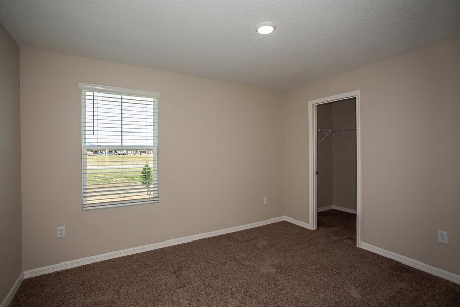 Spacious, unfurnished interior of a new home in Scenic Terrace, Haines City (Image 10).