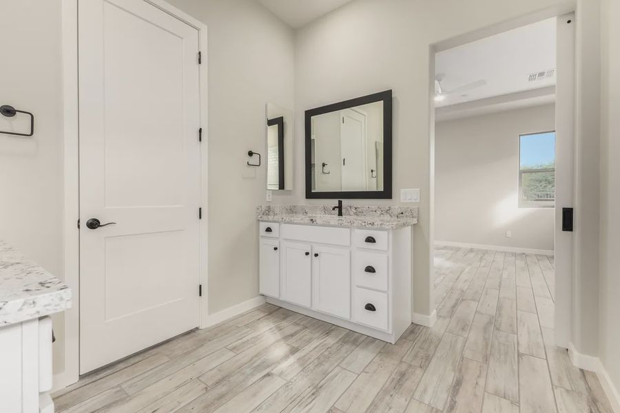 Furnished interior view inside a new home in Valencia at Granite Vista, Waddell (Image 11).