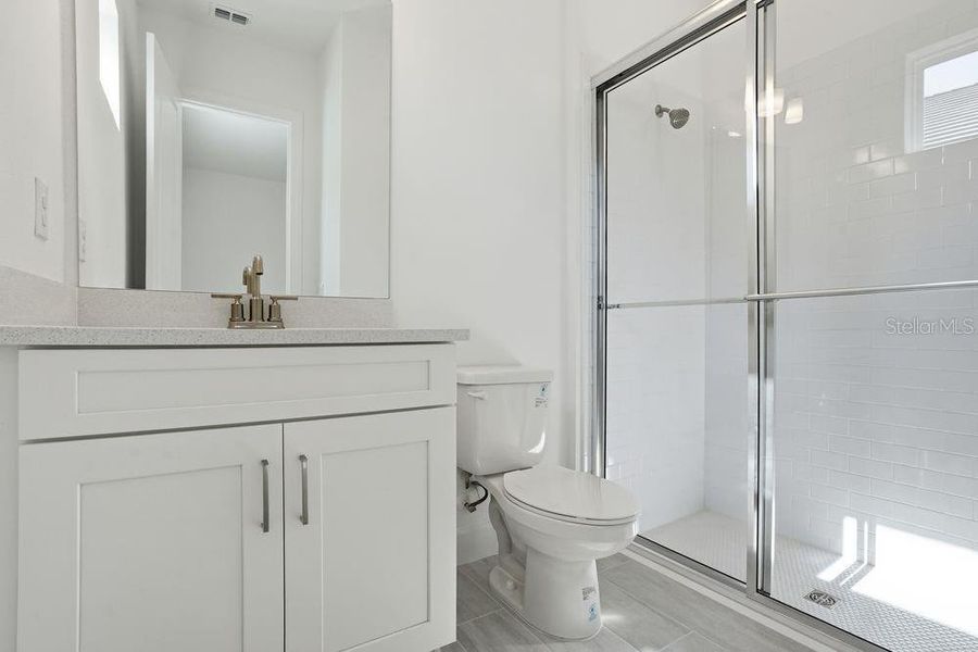 Furnished interior view inside a new home in Esplanade at Coasterra, Palmetto (Image 9).