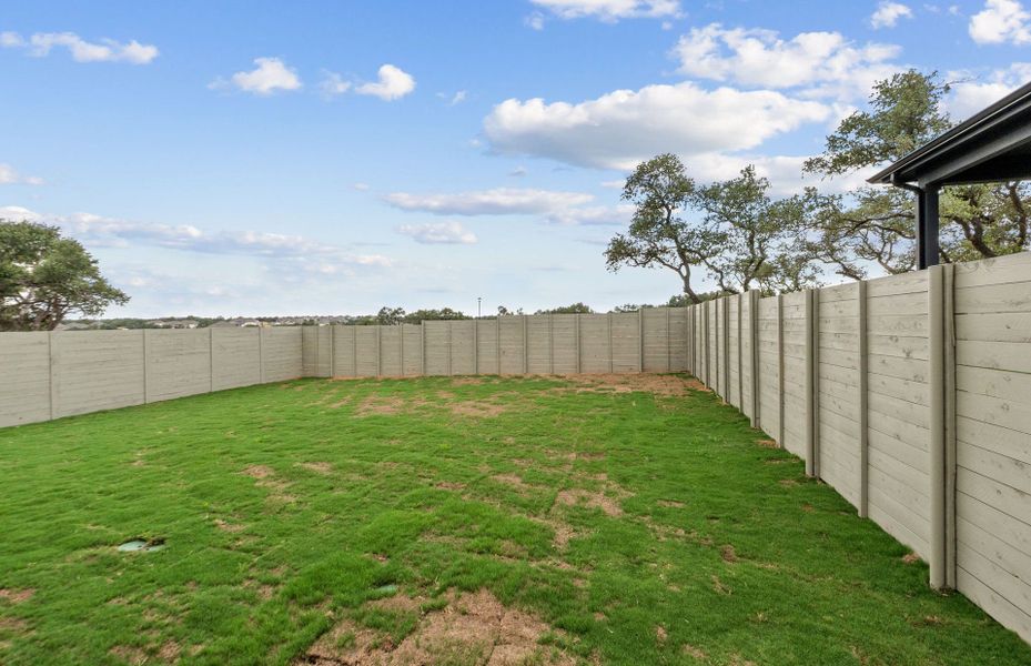 Exterior details and patio area of a home in Wolf Ranch, Georgetown (Image 24). Exterior details and patio area of a home in Wolf Ranch, Georgetown (Image 24).