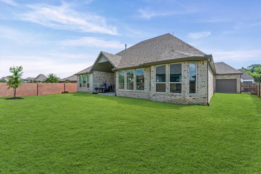 Exterior details and patio area of a home in , Fulshear (Image 3).