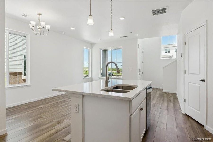 Furnished interior view inside a new home in Pacific Collection at The Townes at Skyline Ridge, Castle Pines (Image 7).