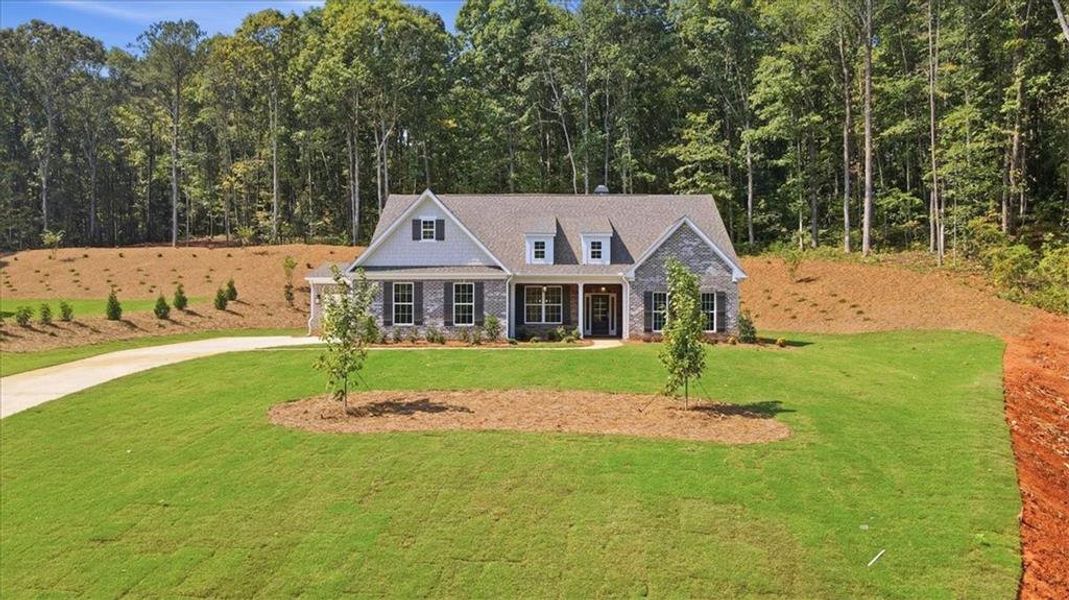 Front exterior of a new home in Bradley Gin, Monroe, GA, highlighting curb appeal (Image 30).
