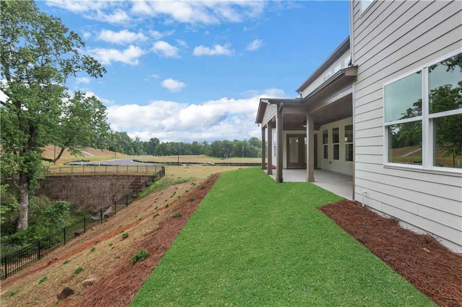 Exterior details and patio area of a home in Arbor West, Dawsonville (Image 33).