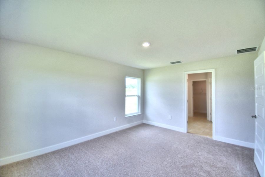 Spacious, unfurnished interior of a new home in Cadence Crossing, Auburndale (Image 33).