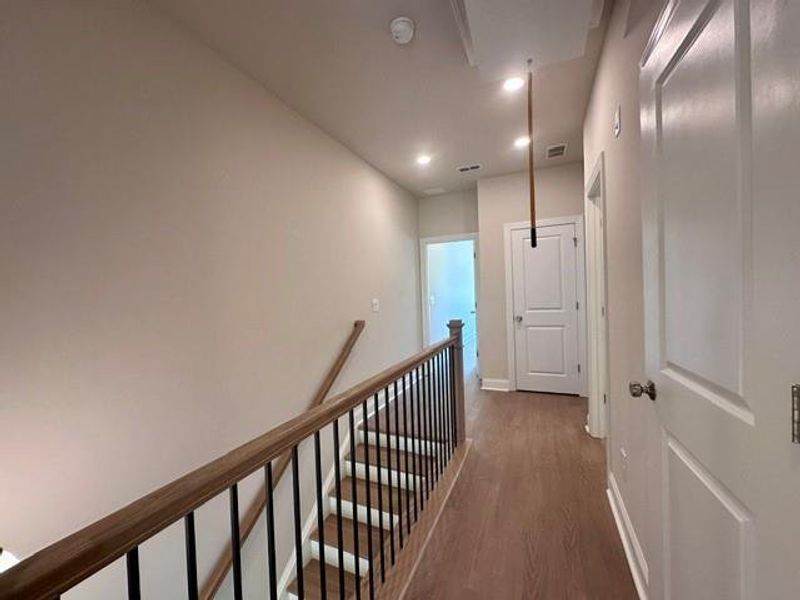 Spacious, unfurnished interior of a new home in Ward's Crossing Townhomes, Johns Creek (Image 20). Spacious, unfurnished interior of a new home in Ward's Crossing Townhomes, Johns Creek (Image 20).