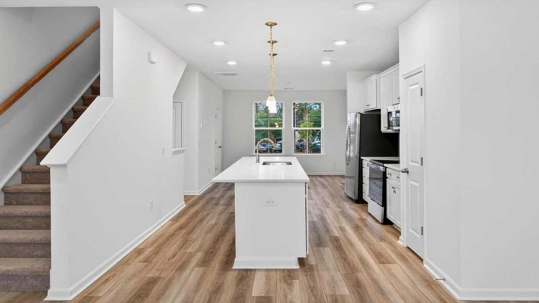 Furnished interior view inside a new home in , North Charleston (Image 6).