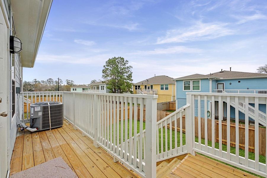 Exterior details and patio area of a home in Peacock Isle, Dickinson (Image 18).