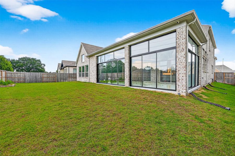 Front exterior of a new home in , Richmond, TX, highlighting curb appeal (Image 24). Front exterior of a new home in , Richmond, TX, highlighting curb appeal (Image 24).