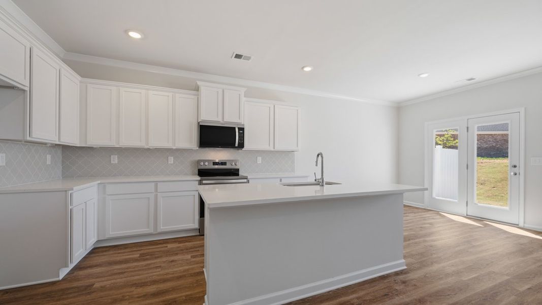 Furnished interior view inside a new home in Independence Villas and Townhomes, Loganville (Image 4).