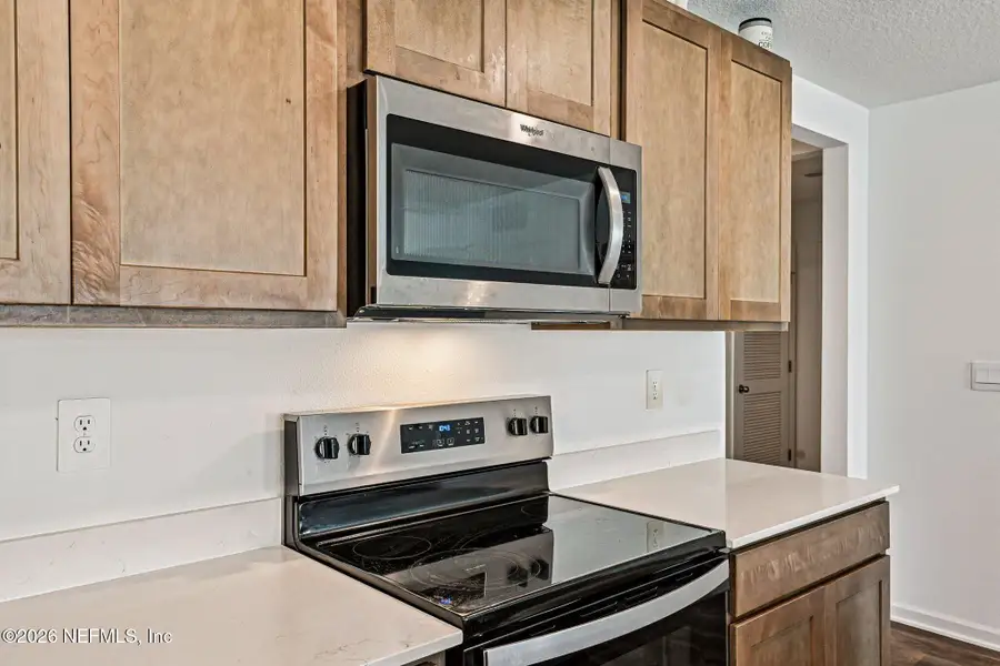 Furnished interior view inside a new home in Cross Creek Express, Green Cove Springs (Image 10).