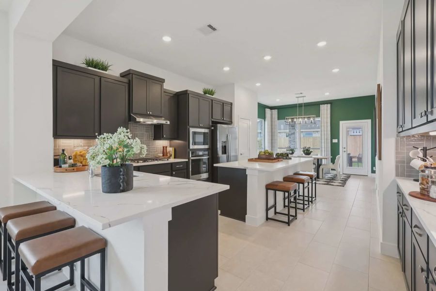 Furnished interior view inside a new home in Sunterra, Katy (Image 6).