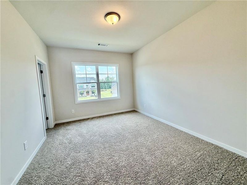 Spacious, unfurnished interior of a new home in Ponderosa Farms Reserve, Gainesville (Image 42).