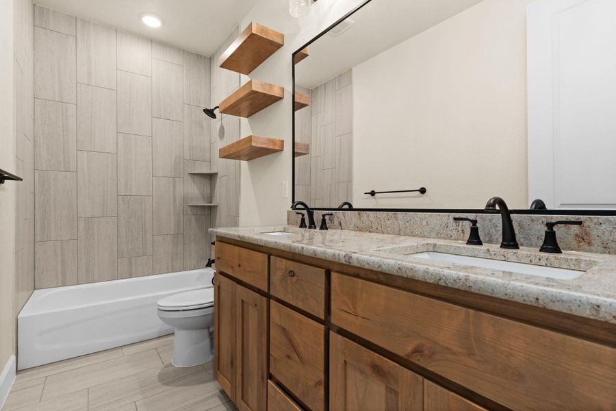 Full bath with double vanity and shower combination Full bath with double vanity and shower combination