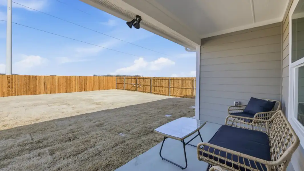 Exterior details and patio area of a home in Hadley Farms, Godley (Image 3).
