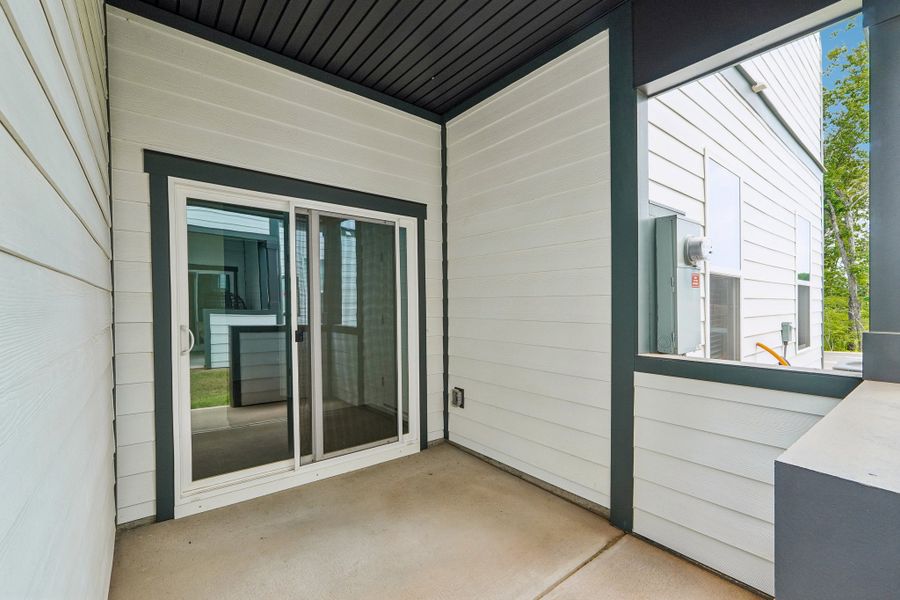 Exterior details and patio area of a home in Terraces at the Exchange, Indian Land (Image 3).
