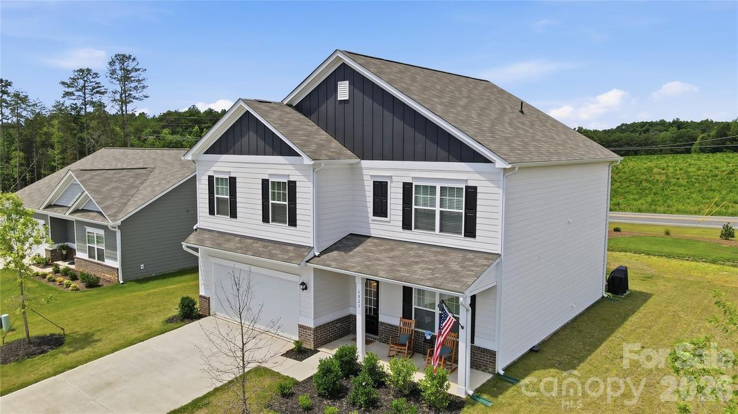 Front exterior of a new home in Pine Bluff, Midland, NC, highlighting curb appeal (Image 24).