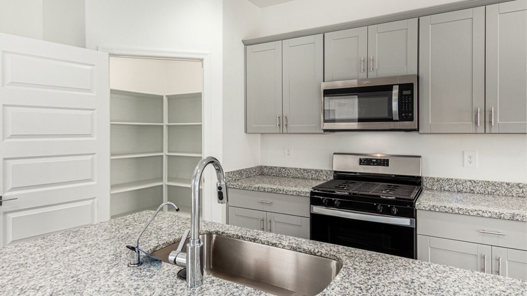 Representative furnished interior of a home built from the Amber by D.R. Horton in Hanson Ridge, Vail (Image 9).