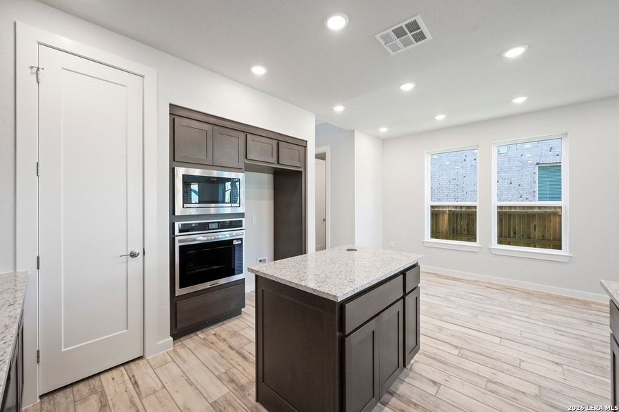 Furnished interior view inside a new home in VIDA, San Antonio (Image 7).