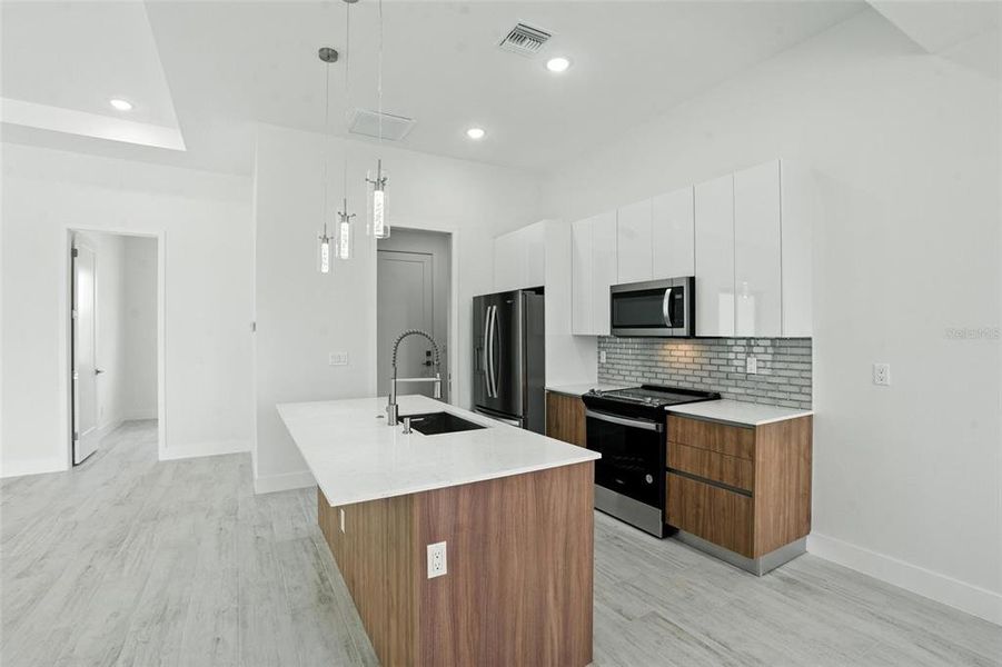 Furnished interior view inside a new home in , Port Charlotte (Image 9).