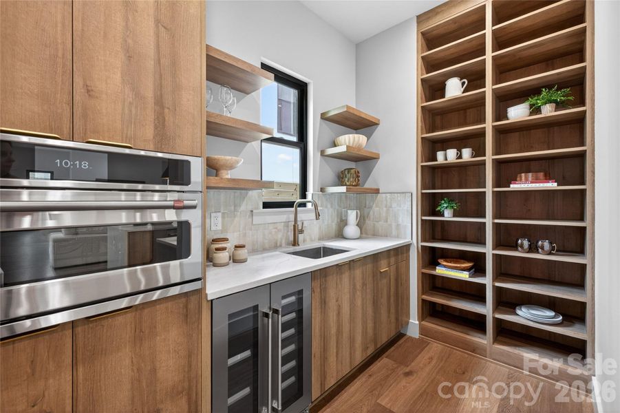 fridge, cabinetry, and storage