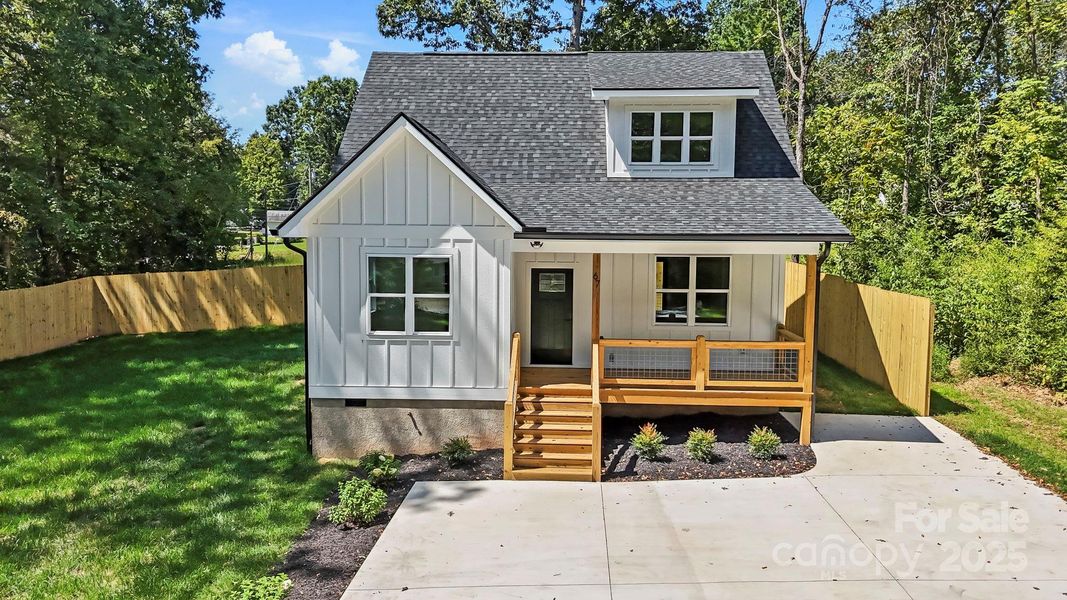 Front exterior of a new home in , Flat Rock, NC, highlighting curb appeal (Image 2).