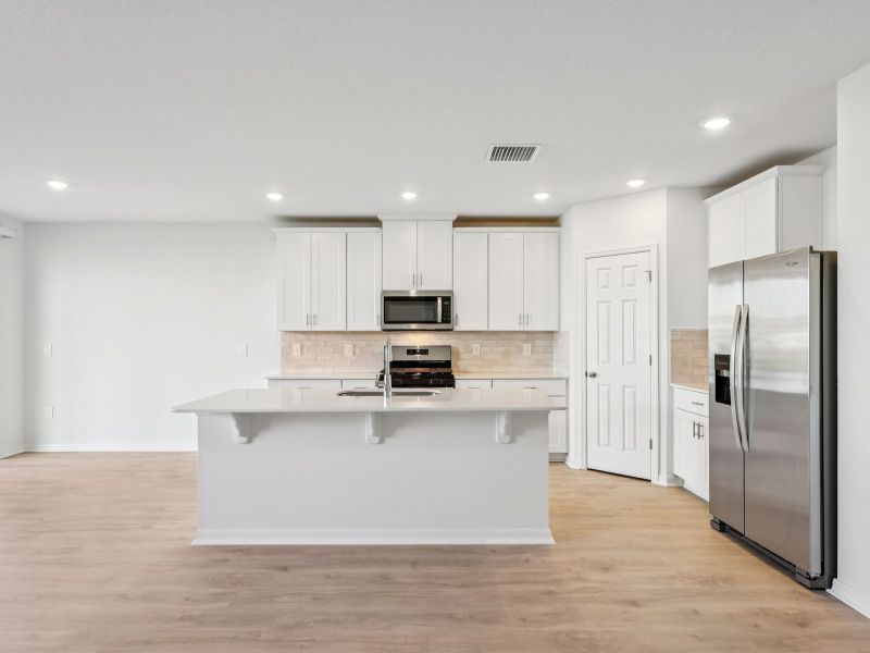 Furnished interior view inside a new home in The Reserve at Hammock Oaks - Signature Series, Lady Lake (Image 3).