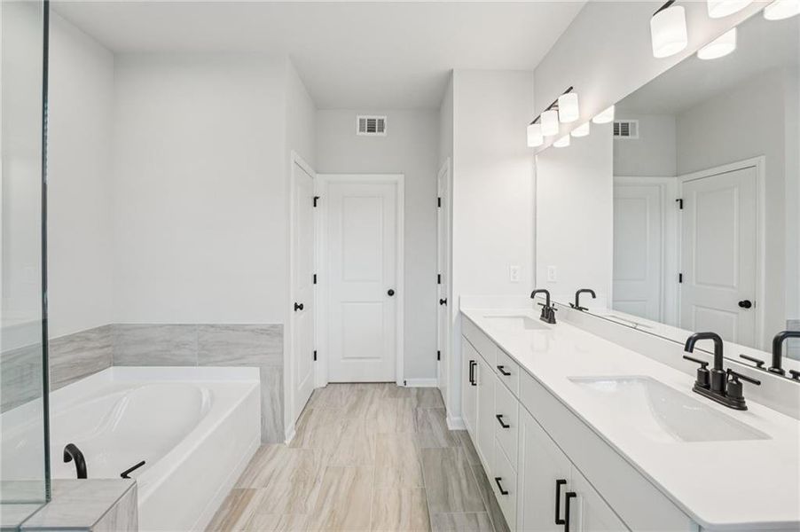 Furnished interior view inside a new home in Tiberon Woods, Cumming (Image 13). Furnished interior view inside a new home in Tiberon Woods, Cumming (Image 13).