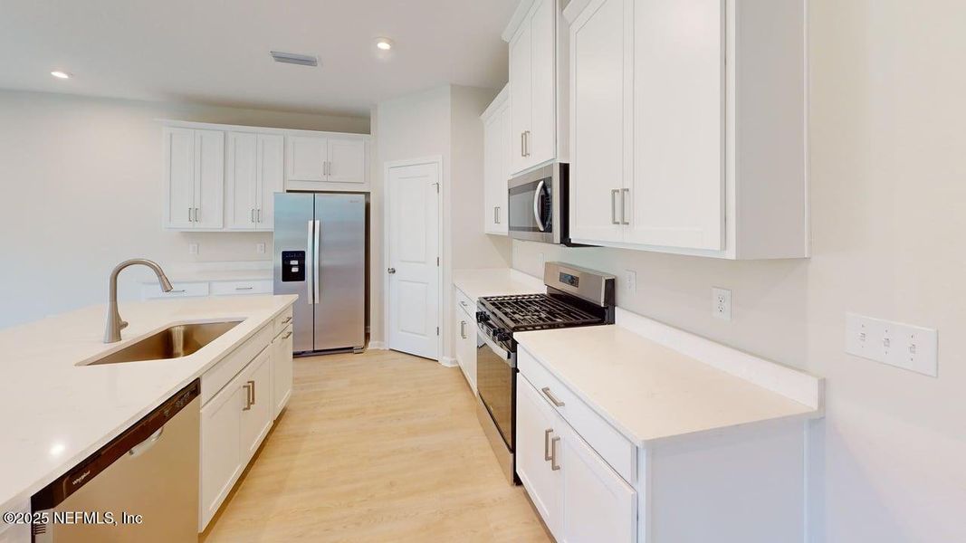 Furnished interior view inside a new home in RiverTown - Forest, St. Johns (Image 5). Furnished interior view inside a new home in RiverTown - Forest, St. Johns (Image 5).