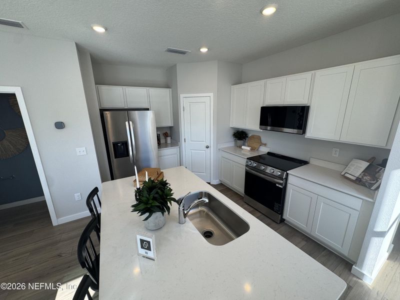 Furnished interior view inside a new home in , Jacksonville (Image 1). Furnished interior view inside a new home in , Jacksonville (Image 1).