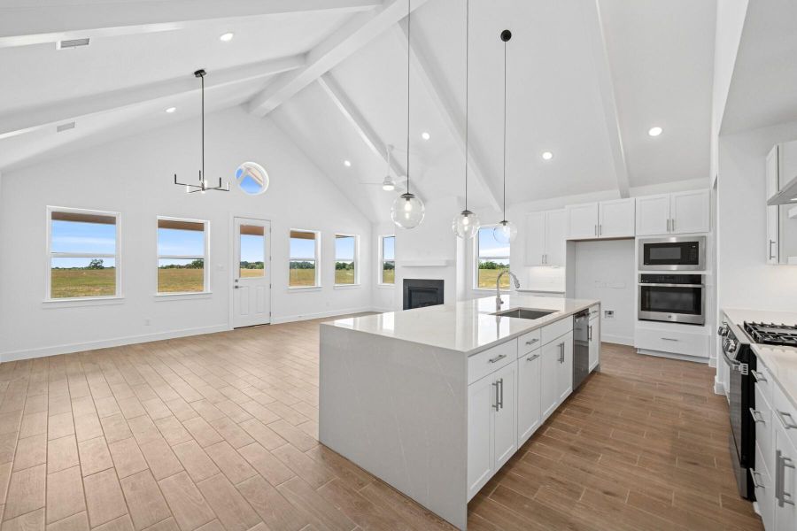 Kitchen open to the dining area and great room Kitchen open to the dining area and great room