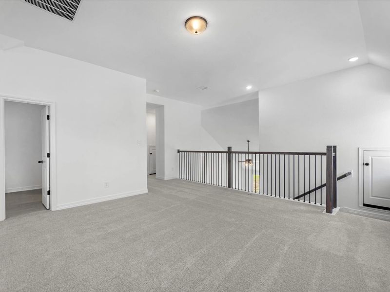 Upstairs loft. Sample product photo. Actual exterior and interior selections may vary by homesite. Photo may be virtually staged.