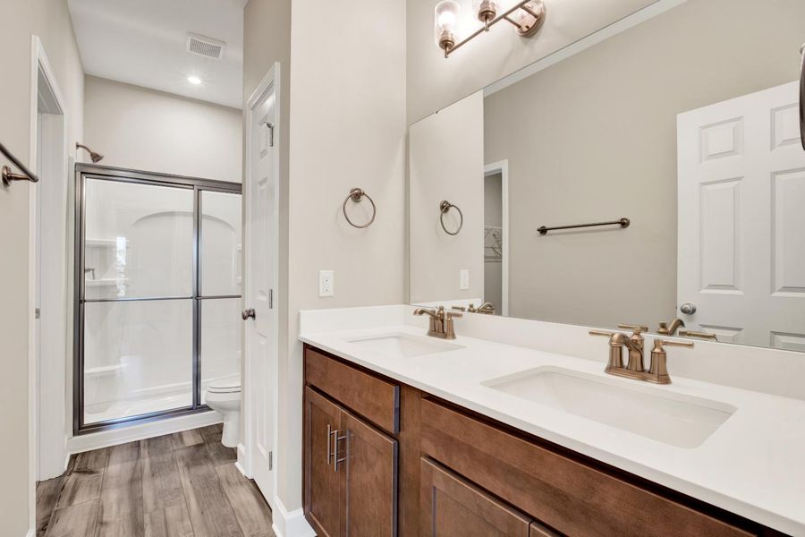 Modern Bathroom Featuring Double Sinks & Satin Nickel Fixtures