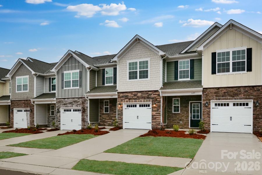Front exterior of a new home in Cannon Village, York, SC, highlighting curb appeal (Image 1). Front exterior of a new home in Cannon Village, York, SC, highlighting curb appeal (Image 1).