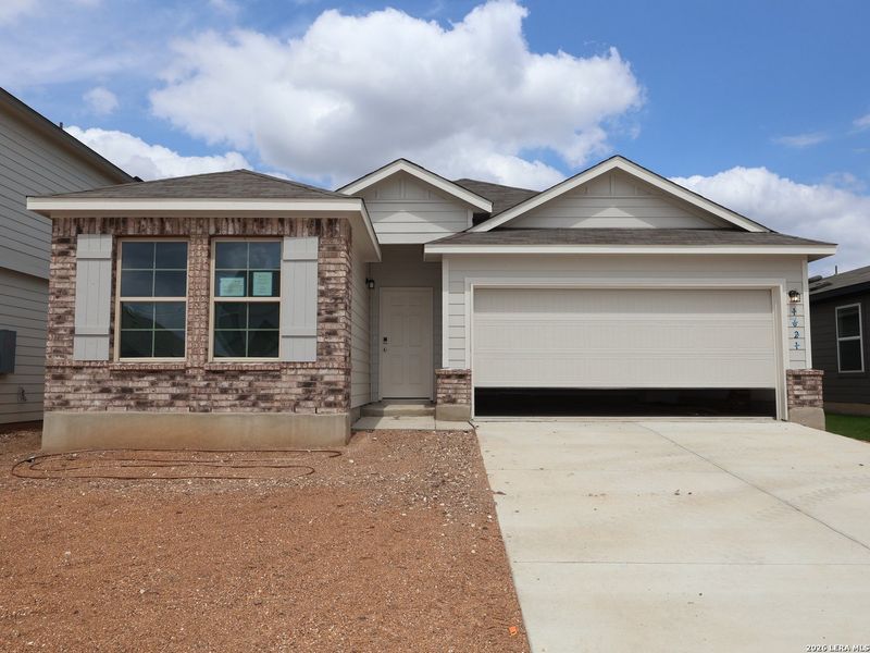 Front exterior of a new home in Meadows at Clear Springs, New Braunfels, TX, highlighting curb appeal (Image 21).