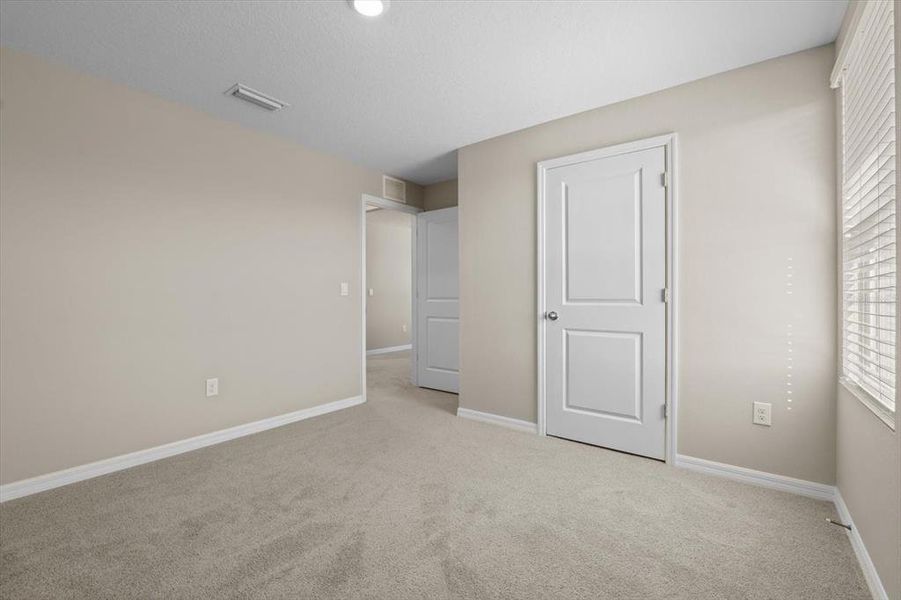 Spacious, unfurnished interior of a new home in Silverstone North, Palmetto (Image 42).