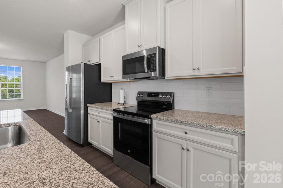 Furnished interior view inside a new home in , Matthews (Image 14).