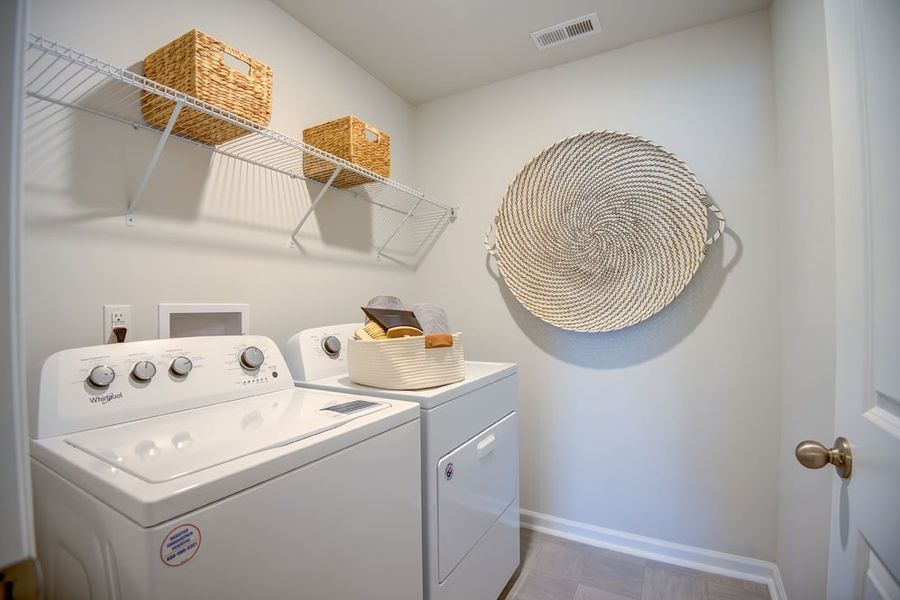 Representative furnished interior of a home built from the PENWELL by D.R. Horton in West New Bern, New Bern (Image 29).