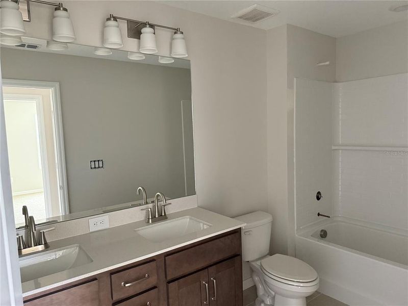 Furnished interior view inside a new home in Oakfield Trails Traditional, Parrish (Image 12). Furnished interior view inside a new home in Oakfield Trails Traditional, Parrish (Image 12).