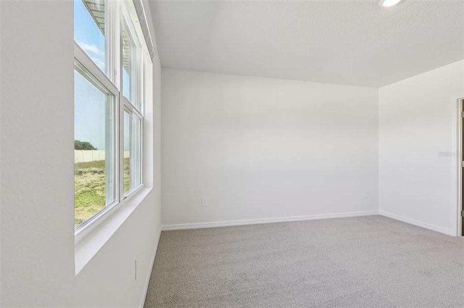 Spacious, unfurnished interior of a new home in Bradbury Creek - Signature Series, Haines City (Image 28).