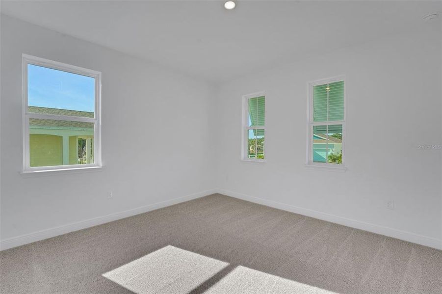 Spacious, unfurnished interior of a new home in Green Key Village, Lady Lake (Image 34).