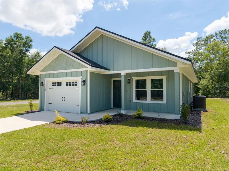 Front exterior of a new home in , Williston, FL, highlighting curb appeal (Image 15).