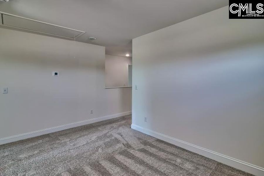 Spacious, unfurnished interior of a new home in Cottages at Roofs Pond, West Columbia (Image 38).