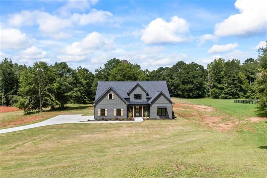 Front exterior of a new home in , Monroe, GA, highlighting curb appeal (Image 28).