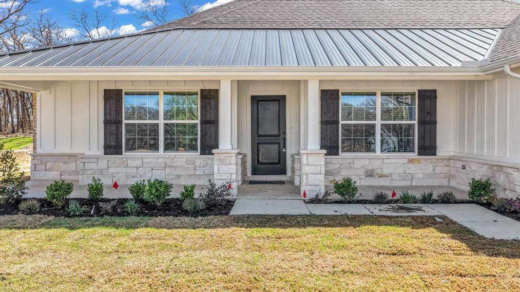 Exterior details and patio area of a home in , Poolville (Image 4).