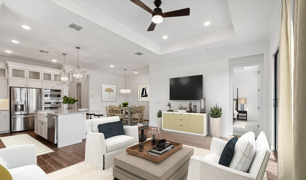 Great room with tray ceiling and luxurious flooring Great room with tray ceiling and luxurious flooring