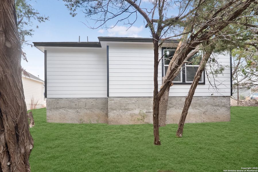 Exterior details and patio area of a home in , Spring Branch (Image 26). Exterior details and patio area of a home in , Spring Branch (Image 26).